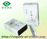 small rectangular tea tin can