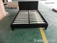 wooden leathe bed
