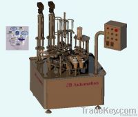 Double Head Volumetric Cup Filling & Sealing Machine