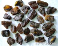 Raw baltic amber stones (black and yellow)