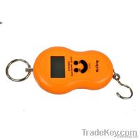 Digital hanging luggage scale with smiley face