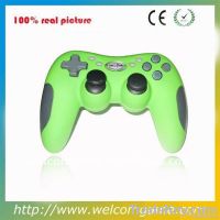 Green wired game joystick for PS2