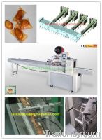 Horizontal plastic film flow-wrapping machine for granular food