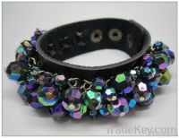 Real leather adjustable bracelet with glass bead