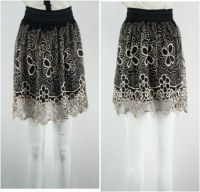 Skirt With A Floral Design And Soft Pleating