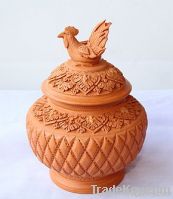 Clay Jar with a hen on top lid