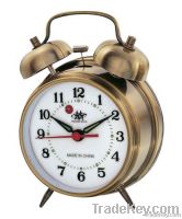 Quartz or Mechanical alarm clocks