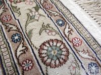 https://www.tradekey.com/product_view/100-Silk-Hand-knotted-Rugs-Carpets-3713124.html