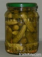 Gherkins in glass jars and Drums