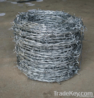 Barbed wire mesh fence