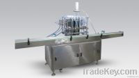 Automatic Six Head Liquid Filling Machine.