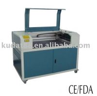 Laser engraving and cutting machine