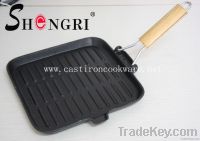 Cast iron grill pan with folding handle