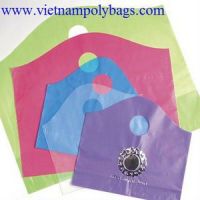 Multi color wave top handle plastic bag
