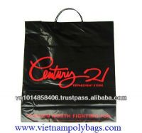 Rigid handle carrier bag