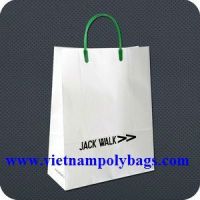 Rigid handle carrier bag