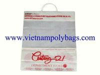Rigid loop handle bags