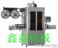 AUTOMATIC SHRINK SLEEVE LABELING MACHINE