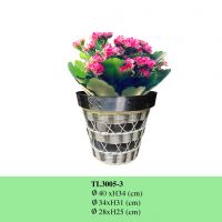 Zinc and poly rattan flower pot