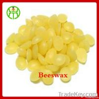 white and yellow  beeswax granules