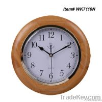 Wooden wall clock with decorative ring
