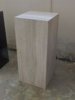 white marble sculpture table