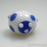 lampwork glass white bead with blue dots