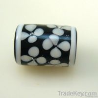 lampwork glass black bead with white floral
