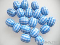 Lampwork glass beads with baking varnish