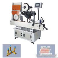 Small bottle labeling machine