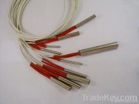 Injection machine cartridge heater element