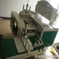 Plastic bag folding machine