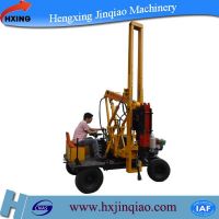 Pile driving and extracting machine