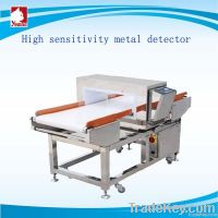 Auto-Conveying Metal Detector