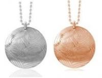 Inori in motion pendant in Steel & Rose Gold