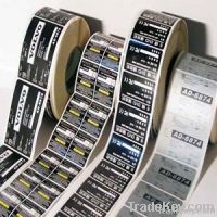 Self adhesive rolled labels and stickers