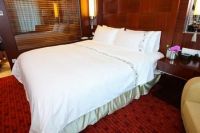 hotel white bed sheet