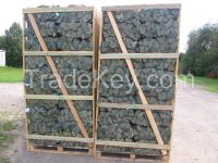 ASH DRIED FIREWOOD LOGS AND KINDLINGS ON PALLET BOXES ( CRATES ) , IN MESH BAGS.