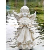Standing polyresin white angel holding candle