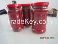 canned tomato paste in glass jar
