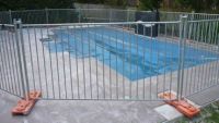 Why to Choose Our Temporary Pool Fencing? A corner of temporary pool fencing system Temporary pool fencing is ideal to secure small children and pets.  Temporary pool fencing is a safety barrier used in many homes to prevent young children and pets from a