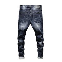 Mans Fashionable Ripped Denim Pants With Patch