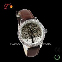 brown ladies wrist watch with stones