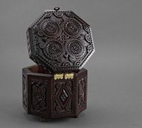 Original carved wooden octahedral box.