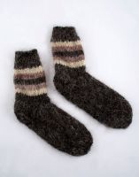 Warm hand knitted woolen socks for women and men.