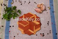 Wooden coaster for hot dishes
