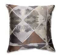 gray and brown geometric throw pillow