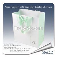Wholesale Attractive    newest    design of paper shopping gift bags with logo for jewelry storage display counter and window    show   