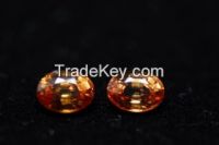 one loose gemstone 0.90ct fancy coloured orange sapphire