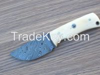 Damascus hunting steel knife with camel bone handle